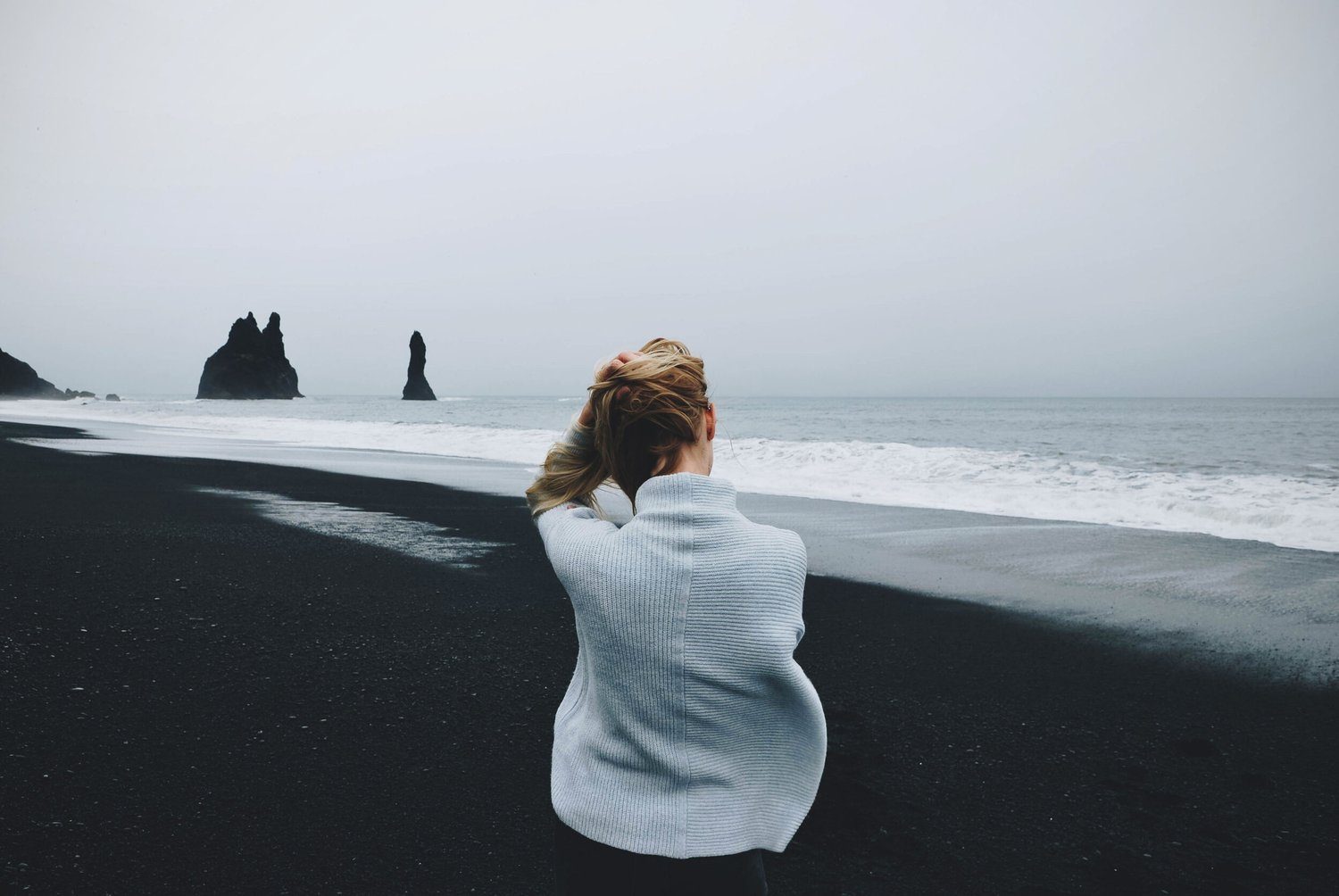 Canva - Woman Wearing Sweater Standing in Front of Beach.jpg